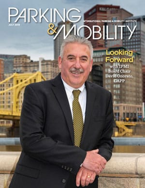The cover of Parking & Mobility magazine showcases the latest advancements in parking and mobility.