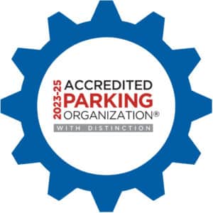 Accredited Parking organization logo inside blue gear