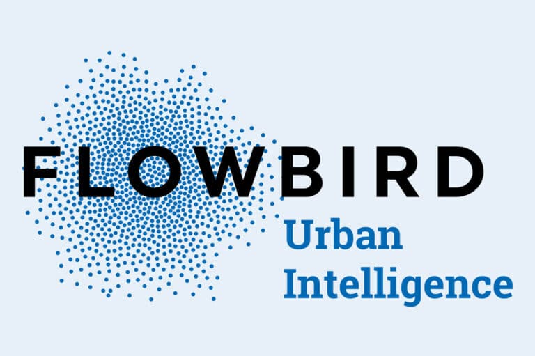 The logo for Flowbird Group featuring Natalie Snow.